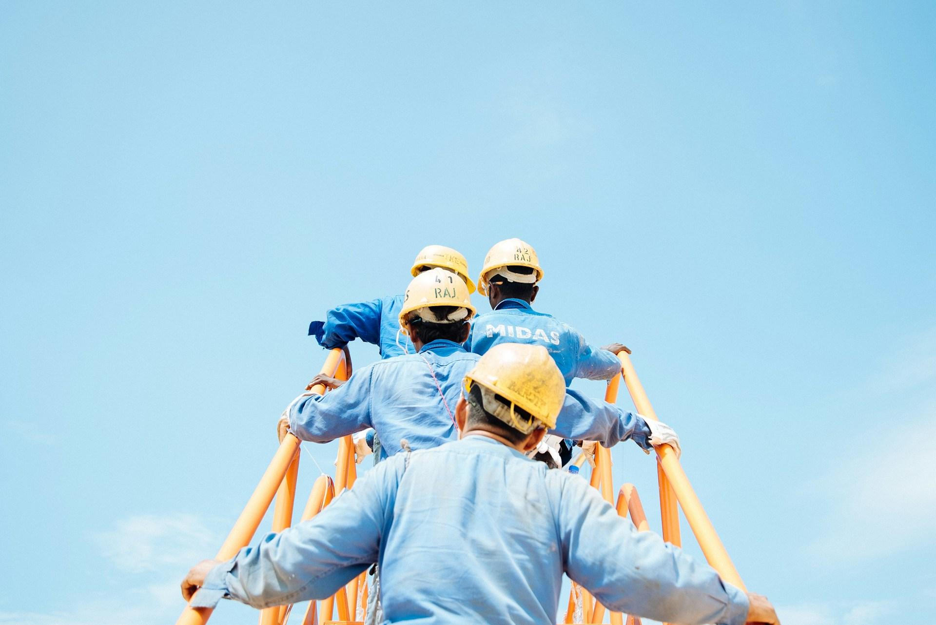 construction workers on scaffolding